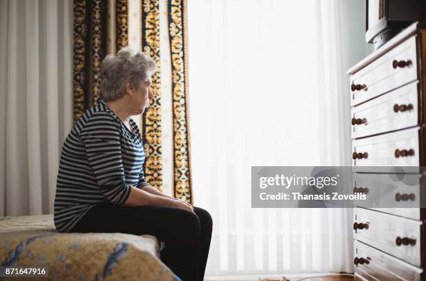 portrait of a senior woman - lonely senior stock pictures, royalty-free photos & images