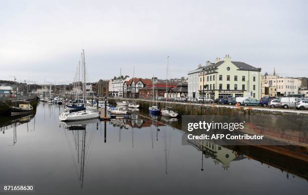 Yachts sit moored in the harbour in Douglas on the Isle of Man, an island in the Irish Sea off of the west coast England, on November 8, 2017. The...