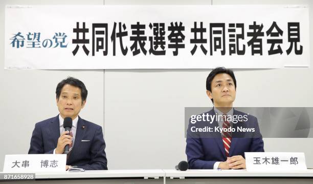 Hiroshi Ogushi and Yuichiro Tamaki, House of Representatives lawmakers of the Party of Hope, attend a press conference in Tokyo on Nov. 8, 2017. The...