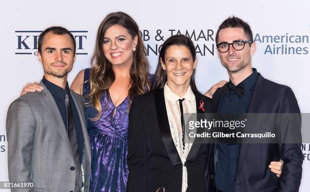 Actress Elizabeth Taylor's Grandchildren, Rhys Tivey, Elizabeth Carson and Quinn Tivey pose with Aileen Getty as the Elton John AIDS Foundation...