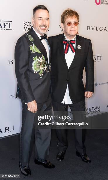 Sir Elton John and David Furnish attend as the Elton John AIDS Foundation commemorates its 25th year and honors founder Sir Elton John during the New...