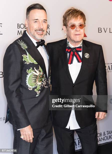 Sir Elton John and David Furnish attend as the Elton John AIDS Foundation commemorates its 25th year and honors founder Sir Elton John during the New...