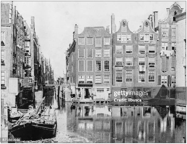 antique photograph of world's famous sites: amsterdam - amsterdam stock illustrations