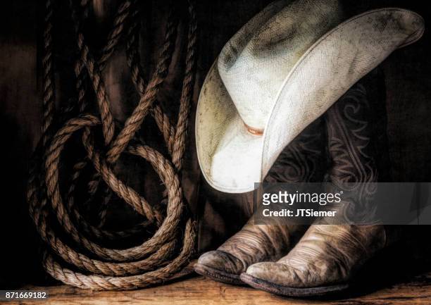 hats boots rope - countrymuziek stockfoto's en -beelden
