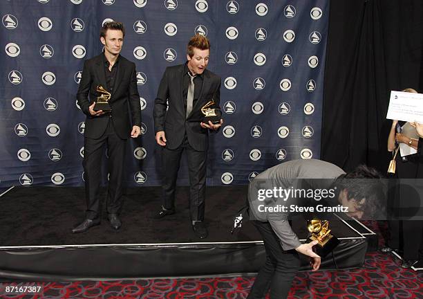 Mike Dirnt, Tre Cool, and Billie Joe Armstrong of Green Day, winners of Record Of The Year for "Boulevard Of Broken Dreams"
