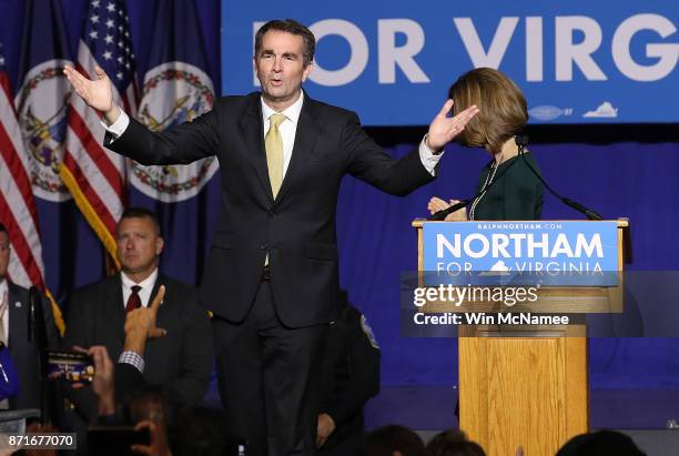 Virginia Governor-elect Ralph Northam greets supporters at an election night rally November 7, 2017 in Fairfax, Virginia. Northam defeated Republican...