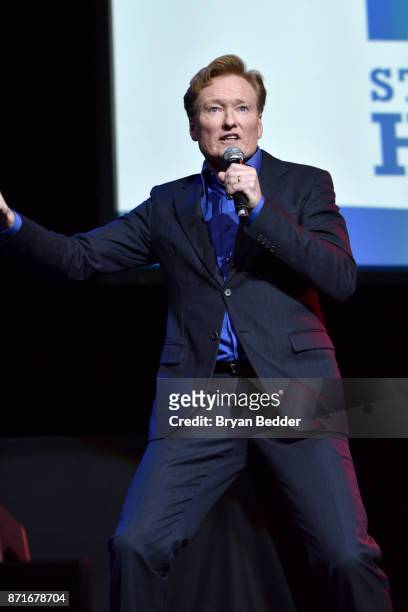 Conan O'Brien speaks onstage during the 11th Annual Stand Up for Heroes Event presented by The New York Comedy Festival and The Bob Woodruff...