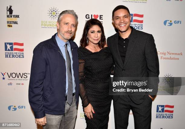 Jon Stewart, Caroline Hirsch, and Trevor Noah attend the 11th Annual Stand Up for Heroes Event presented by The New York Comedy Festival and The Bob...