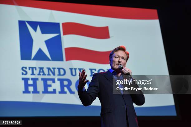 Conan O'Brien speaks onstage during the 11th Annual Stand Up for Heroes Event presented by The New York Comedy Festival and The Bob Woodruff...