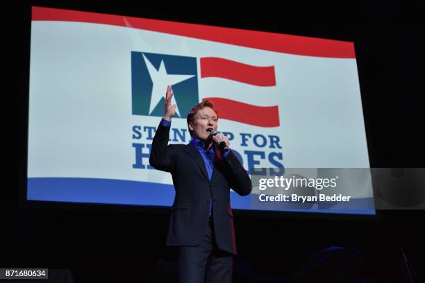 Conan O'Brien speaks onstage during the 11th Annual Stand Up for Heroes Event presented by The New York Comedy Festival and The Bob Woodruff...