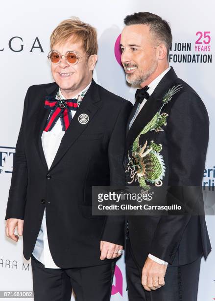 Sir Elton John and David Furnish attend as Elton John AIDS Foundation Commemorates Its 25th Year And Honors Founder Sir Elton John During New York...