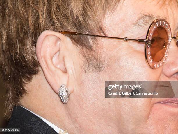 Sir Elton John, jewelry detail, attends as Elton John AIDS Foundation Commemorates Its 25th Year And Honors Founder Sir Elton John During New York...