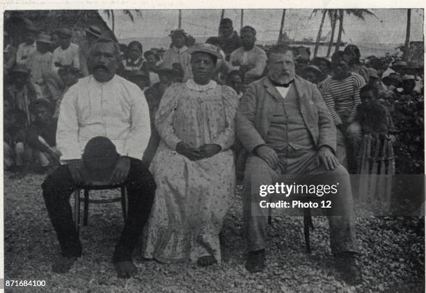 Prime Minister of New Zealand Richard Seddon and wife Mrs. Seddon with the King and Queen of Mangaia. Dated 1900.