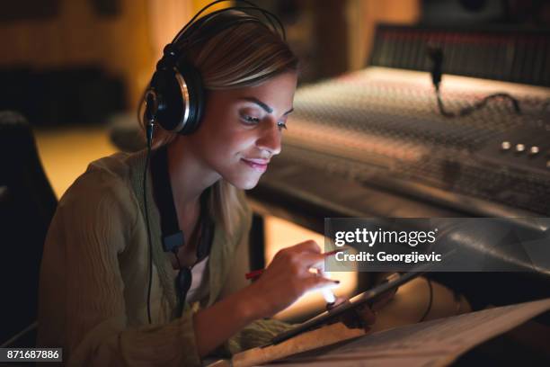 creating a hit takes time... - songwriter stock pictures, royalty-free photos & images