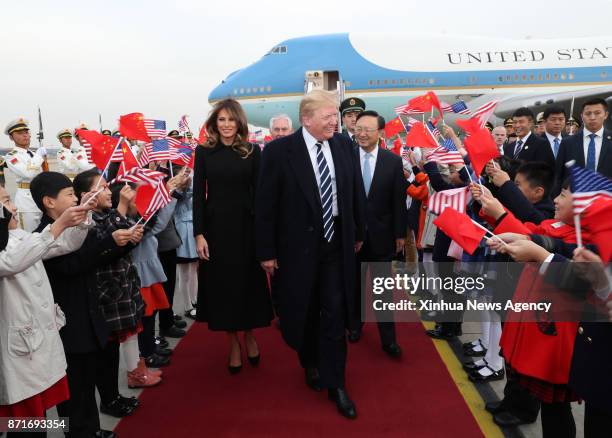 Nov. 8, 2017: U.S. President Donald Trump, greeted by Chinese State Councilor Yang Jiechi , arrives in Beijing on Nov. 8 starting his state visit to...