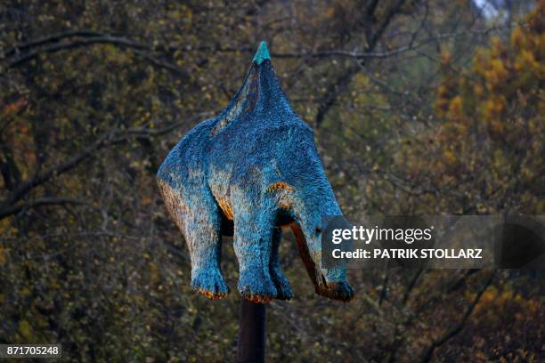 The bronze sculpture "Unbearable" by the Danish artist Jens Galschiot featuring an polar bear impaled on an oil pipeline is on display at Rheinaue...