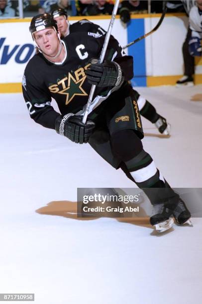 Derian Hatcher of the Dallas Stars skates against the Toronto Maple Leafs during NHL game action on March 15, 1996 at Maple Leaf Gardens in Toronto,...