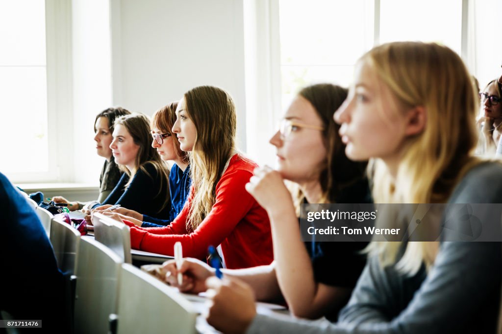Taking Notes In Lecture University Students Taking Notes In Lecture Hall High-Res Stock Photo ...