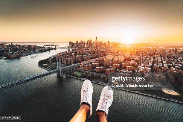 flying over manhattan - passenger point of view stock pictures, royalty-free photos & images