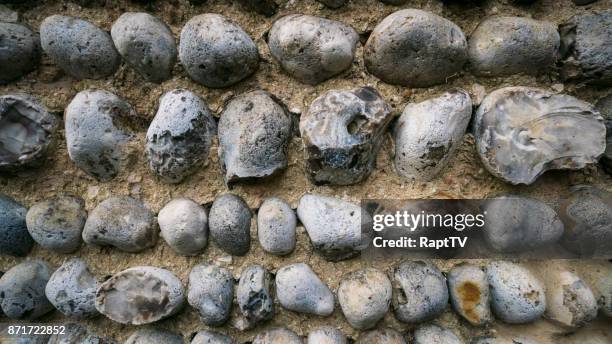 a flint stone wall. - chert stock pictures, royalty-free photos & images