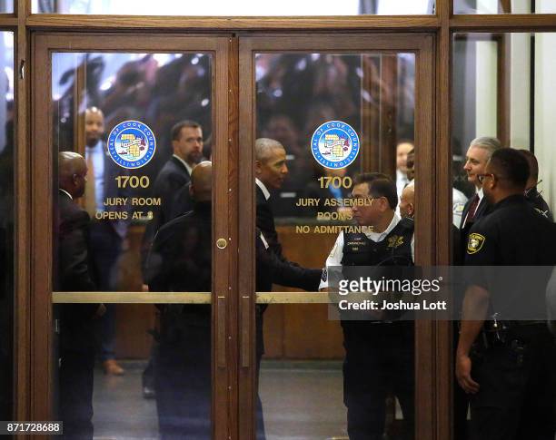 Former President Barack Obama arrives for Cook County jury duty at the Daley Center on November 8, 2017 in Chicago, Illinois. Jurors receive $17.20...