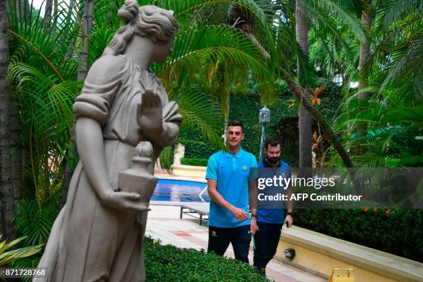 Australia's footballer Tomi Juric arrives to meet the press at the hotel in San Pedro Sula, Honduras, on November 8, 2017 just days ahead of the...