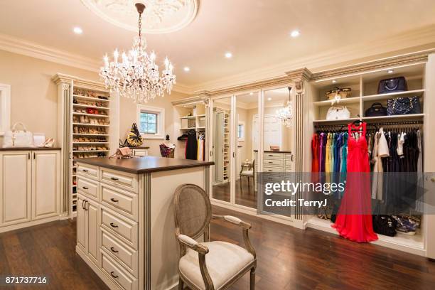 beautiful custom closet in an estate home - purse stock pictures, royalty-free photos & images