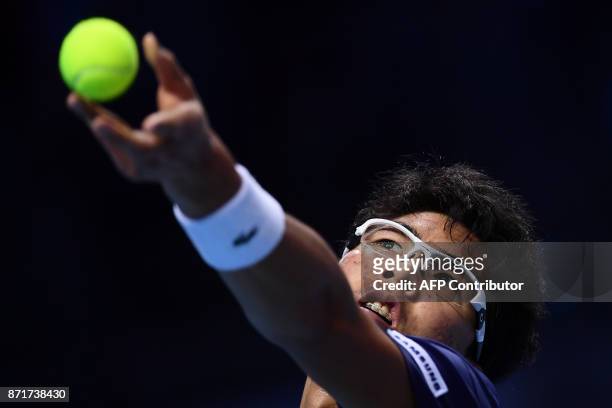 South Korea Hyeon Chung serves to Russia's Andrey Rublev during their men's singles tennis match of the first edition of the Next Generation ATP...