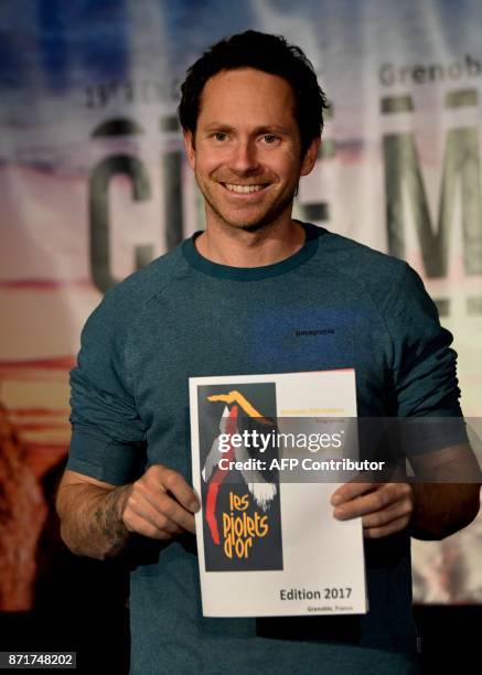 Mountaineer Colin Haley poses for pictures ahead of the awarding ceremony of the Piolets d'Or prize in Grenoble, eastern France, on November 8, 2017....