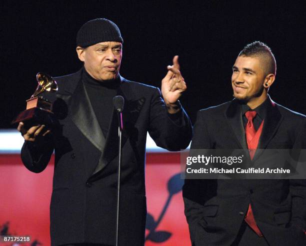 Al Jarreau, winner Best Traditional R&B Vocal Performance for "God Bless the Child," with son Ryan