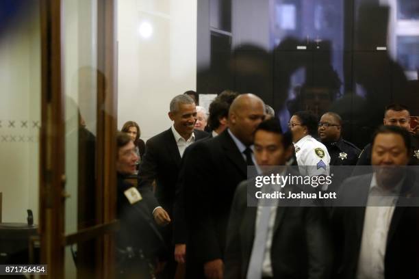 Former President Barack Obama attends Cook County jury duty at the Daley Center on November 8, 2017 in Chicago, Illinois. Jurors receive $17.20 for...