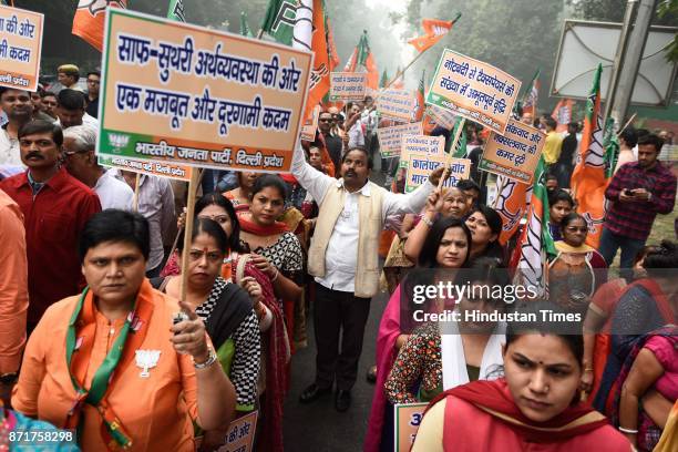 Anti Black Money Day observed by Bhartiya Janata Party leaders, activists and workers as they march from Ashoka Road to Connaught Place in support of...