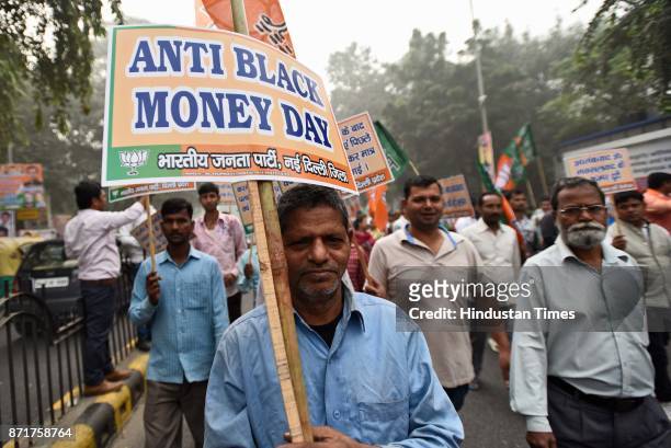 Anti Black Money Day observed by Bhartiya Janata Party leaders, activists and workers as they march from Ashoka Road to Connaught Place in support of...
