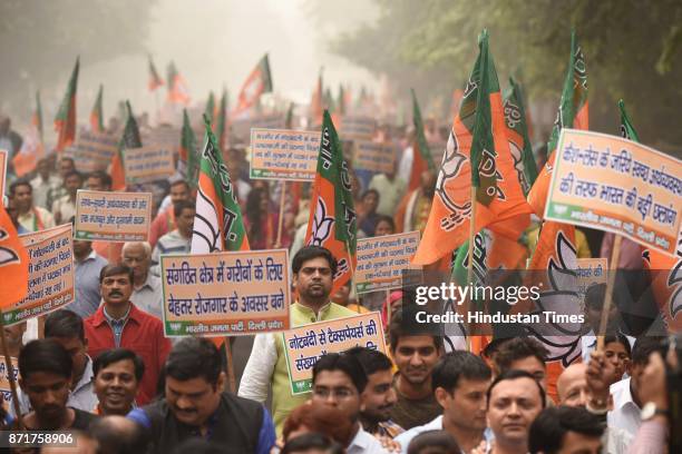 Anti Black Money Day observed by Bhartiya Janata Party leaders, activists and workers as they march from Ashoka Road to Connaught Place in support of...