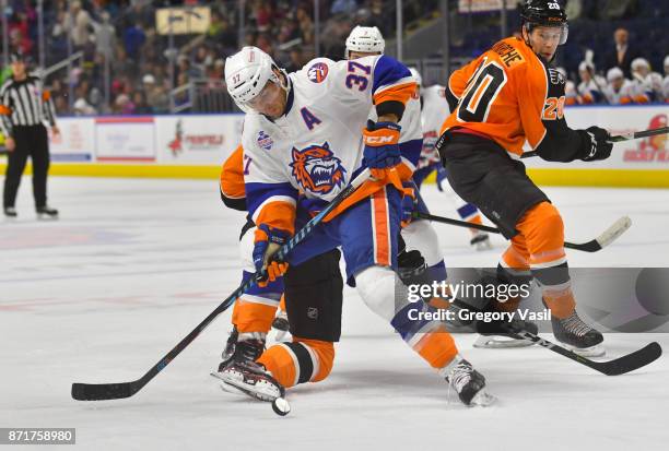 Steve Bernier of the Bridgeport Sound Tigers looks to control the puck at the Webster Bank Arena on November 8, 2017 in Bridgeport, Connecticut.