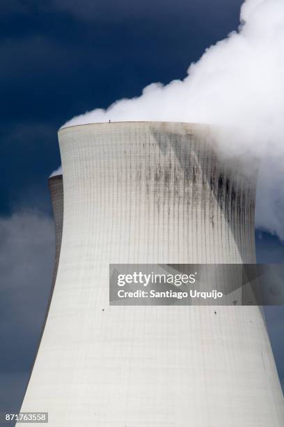 cooling tower of the doel nuclear power station - scheldt river stock pictures, royalty-free photos & images