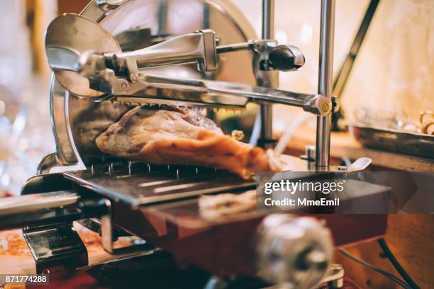 meat slicer with prosciutto - prosciutto stock pictures, royalty-free photos & images