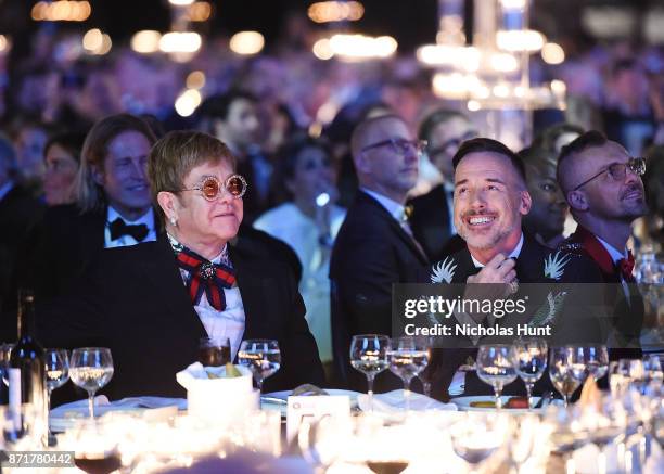 Sir Elton John and David Furnish attend the Elton John AIDS Foundation Commemorates Its 25th Year And Honors Founder Sir Elton John During New York...