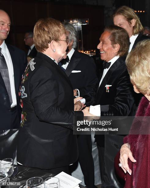 Sir Elton John and Valentino Garavani attend the Elton John AIDS Foundation Commemorates Its 25th Year And Honors Founder Sir Elton John During New...