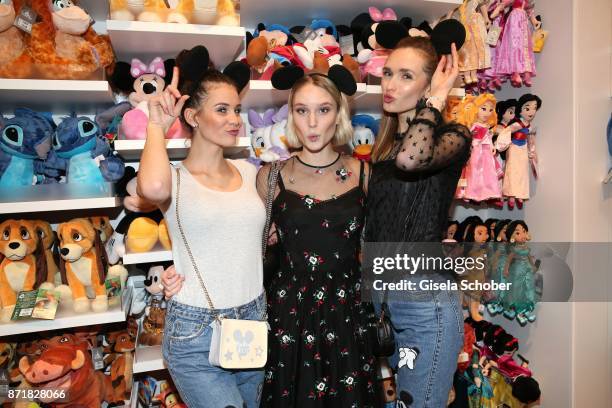 Model Betty Taube-Guenter, Kim Hnizdo and Anne Wilken during the Disney Store VIP opening on November 8, 2017 in Munich, Germany.
