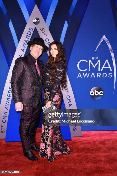 Singer songwriter Jerrod Niemann and Morgan Petek Niemann attend the 51st annual CMA Awards at the Bridgestone Arena on November 8, 2017 in...