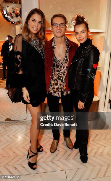 Amber Le Bon, Ollie Proudlock and Emma Louise Connolly attend the Jimmy Choo x Annabel's party on November 8, 2017 in London, England.