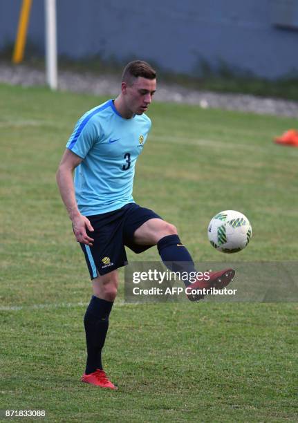 Australian footballer Alex Gersbach controls the ball during a training session at Francisco Morazan stadium in San Pedro Sula, 180 kilometres north...