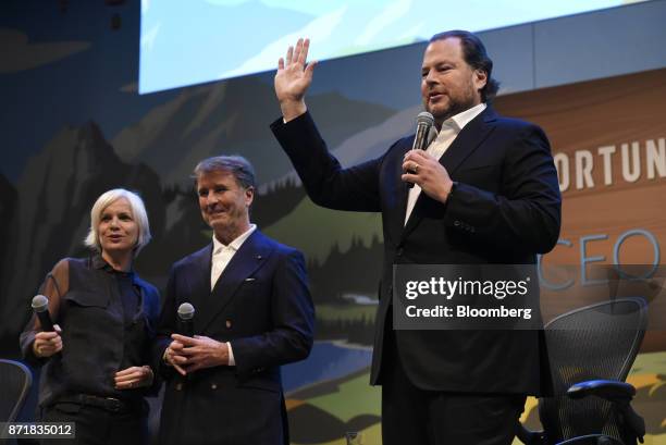 Marc Benioff, chairman and chief executive officer of Salesforce.com Inc., right, speaks as Brunello Cucinelli, chief executive officer of Brunello...