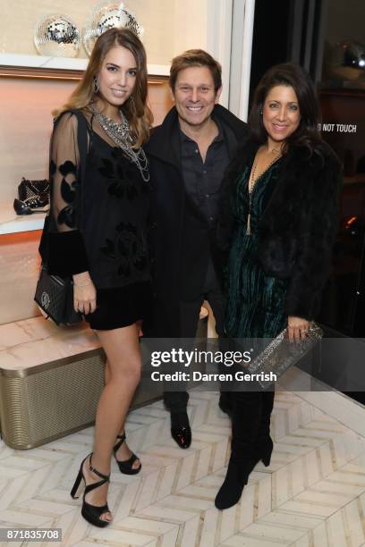 Amber Le Bon, Roger Taylor and Gisella Bernales attend Jimmy Choo X Annabel's party hosted by Pierre Denis, CEO and Derek Blasberg at 27 New Bond...