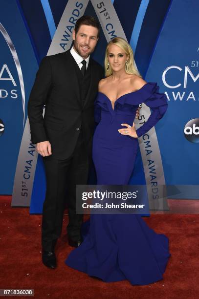 Player Mike Fisher and singer-songwriter Carrie Underwood attend the 51st annual CMA Awards at the Bridgestone Arena on November 8, 2017 in...