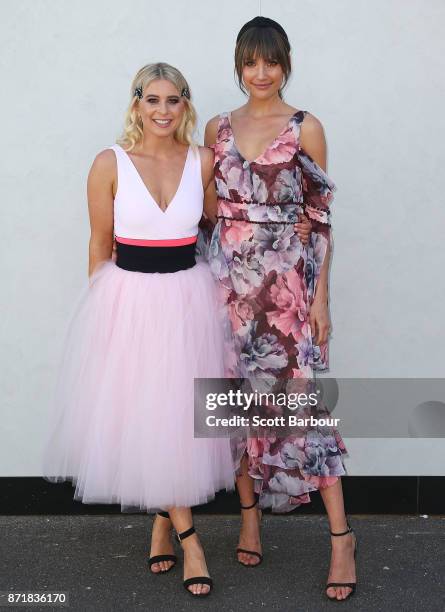 Rachael Finch and Emma Davenport attend on Oaks Day at Flemington Racecourse on November 9, 2017 in Melbourne, Australia.