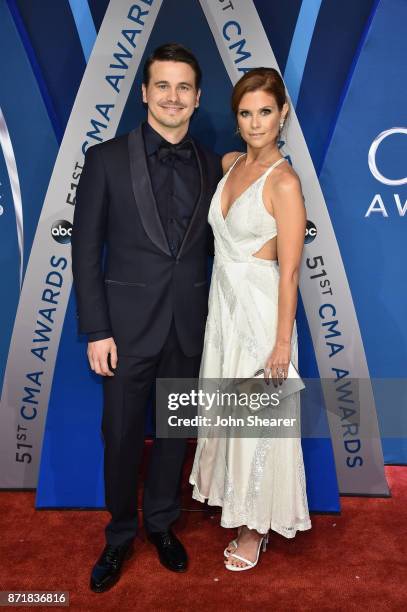 Actors Jason Ritter and JoAnna Garcia Swisher attend the 51st annual CMA Awards at the Bridgestone Arena on November 8, 2017 in Nashville, Tennessee.