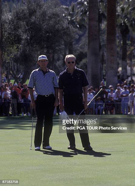 Former President Gerald Ford with PGA TOUR player Scott Hoch line up a putt during the the 1995 Bob Hope Chrysler Classic in Palm Springs, CA