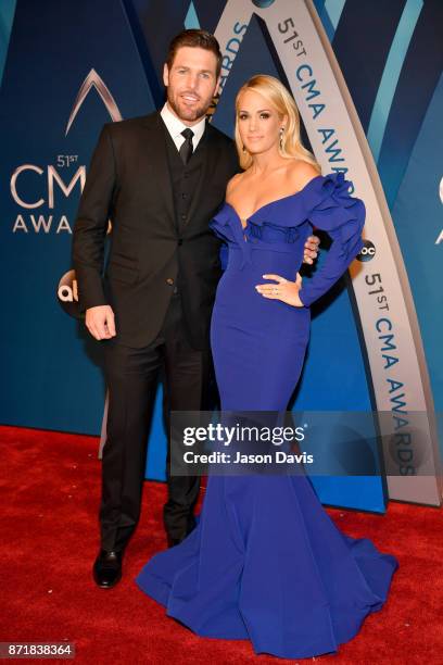 Player Mike Fisher and singer-songwriter Carrie Underwood attend the 51st annual CMA Awards at the Bridgestone Arena on November 8, 2017 in...